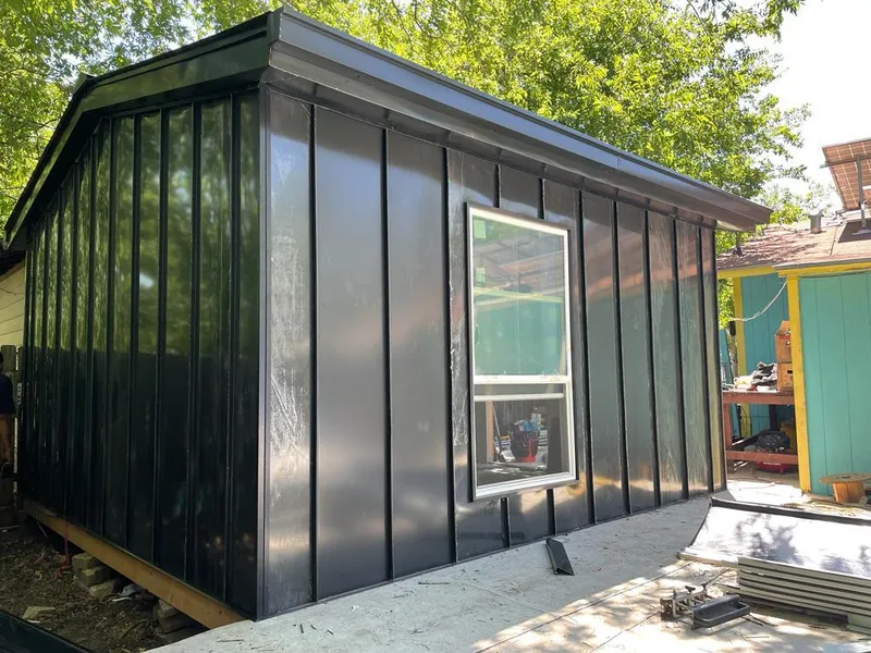 Black standing seam metal wall panels for Metal Roof Installation in Silver Firs